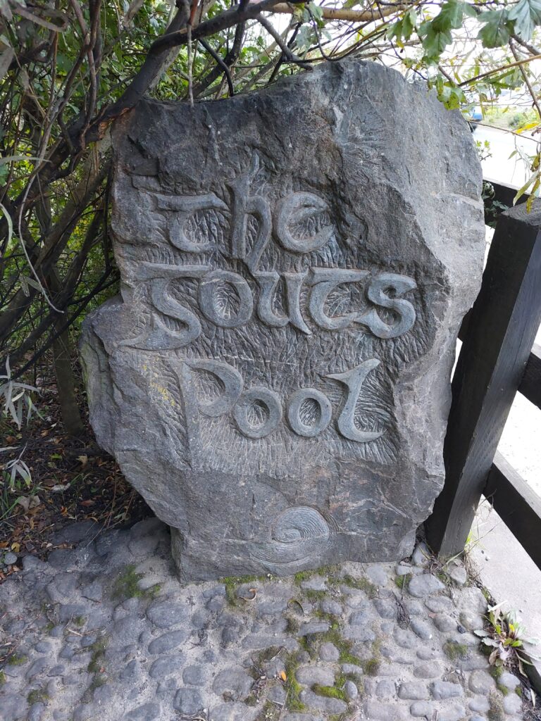 Stone slab with text carved into it The Gouts Pool, Cashel