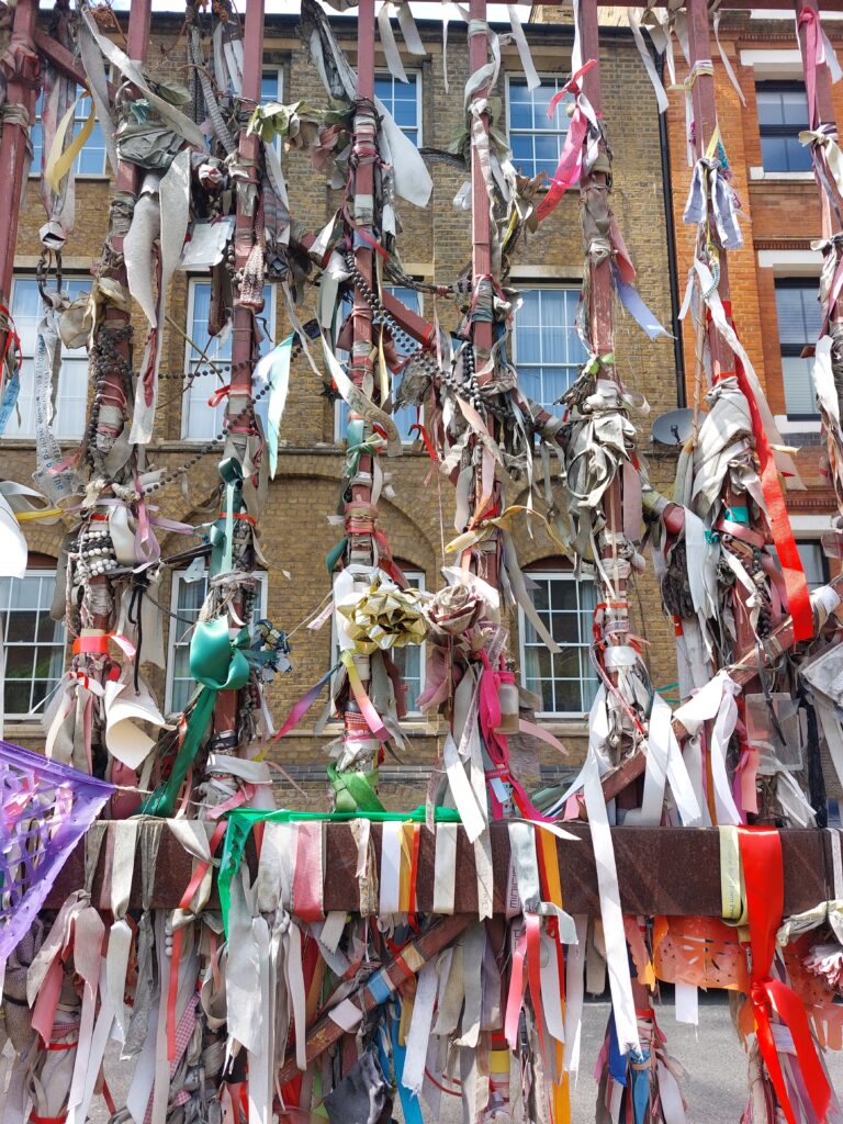 Ribbons tied to the railings of Crossbones Graveyard in London to remember the "outcast dead"