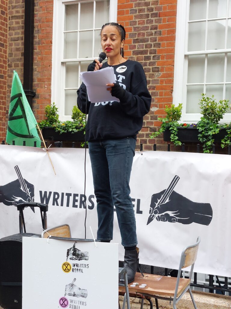 Zadie Smith on a soapbox outside 55 Tufton Street, London as part of the Writers Rebel event in April 2023