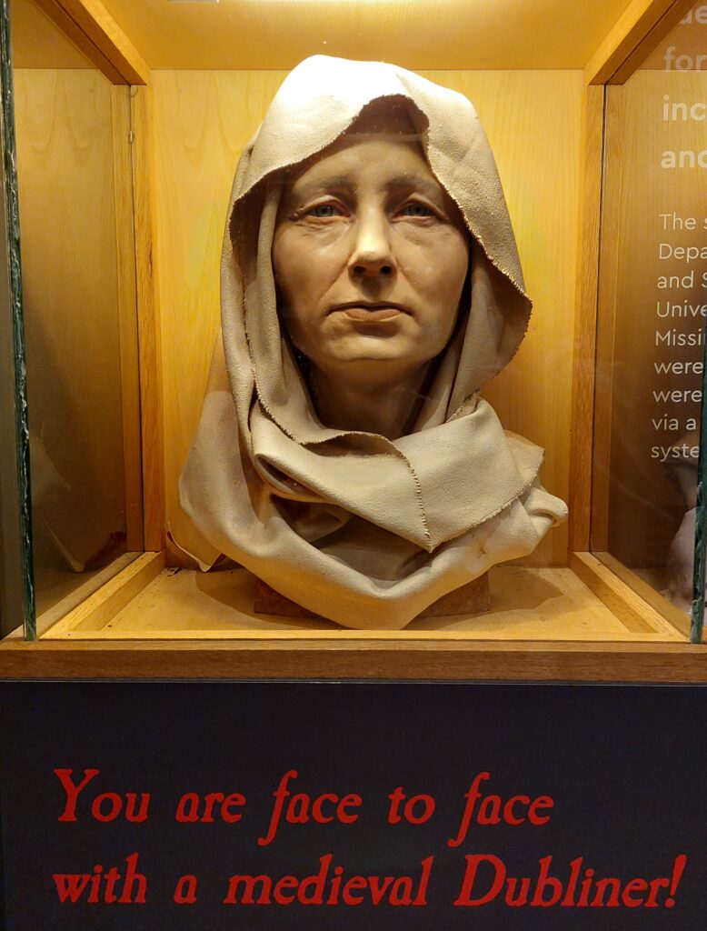 Reproduction of a medieval woman in Dublin would look like, wearing a head and neck scarf
