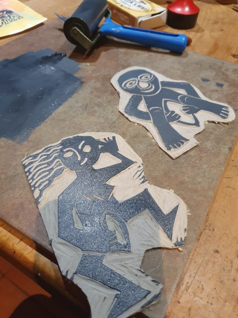 Lino print of a Sheela na Gig.