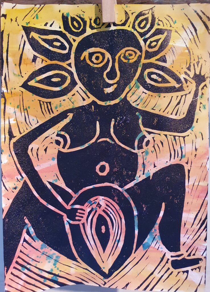 Lino print of a Sheela na Gig.